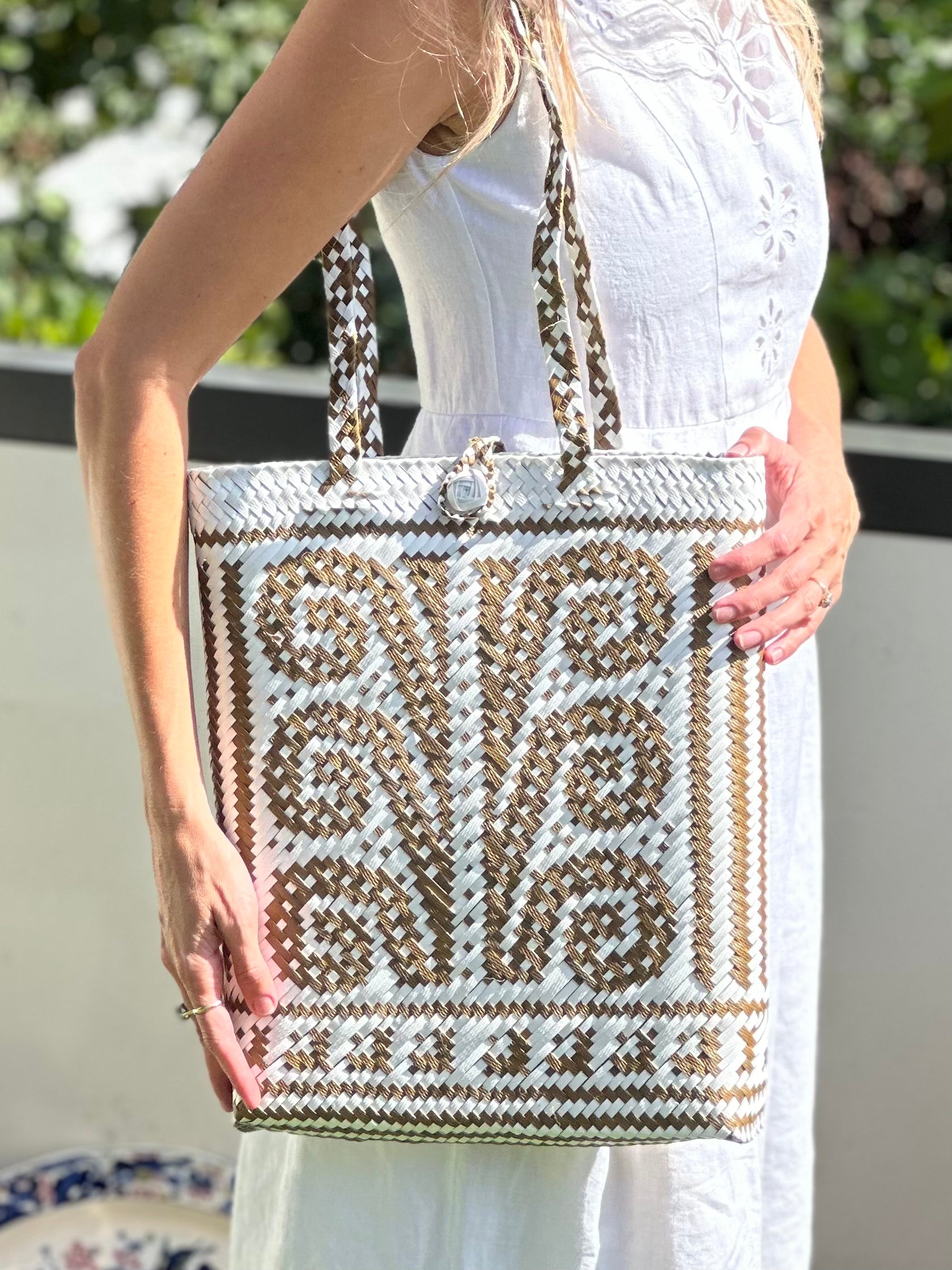 Koru pattern olive & white plaited handle slimline shoulder bag